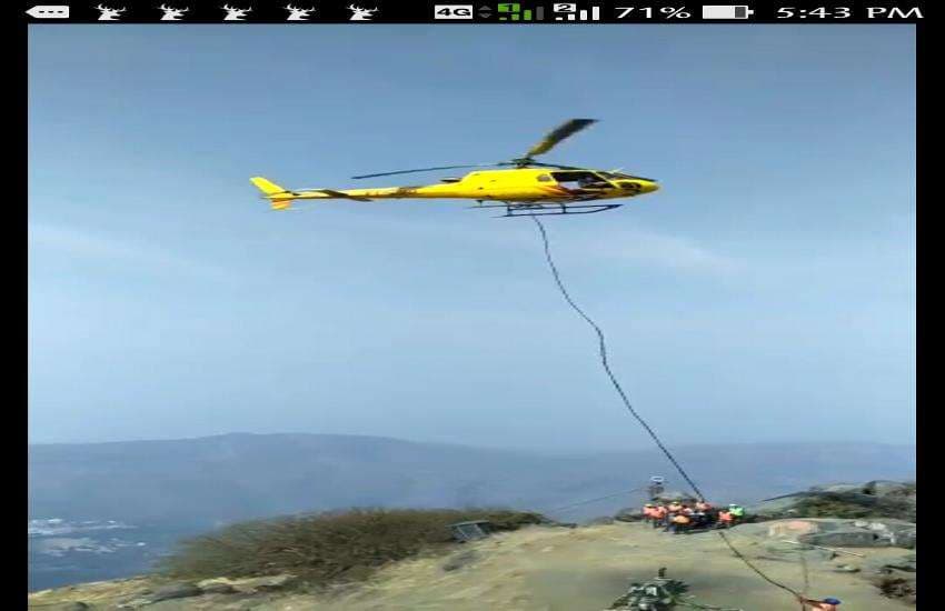 Working of Girnar Ropeway with the help of helicopter in junagadh