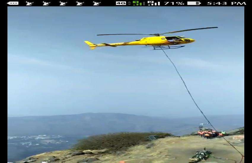 Working of Girnar Ropeway with the help of helicopter in junagadh