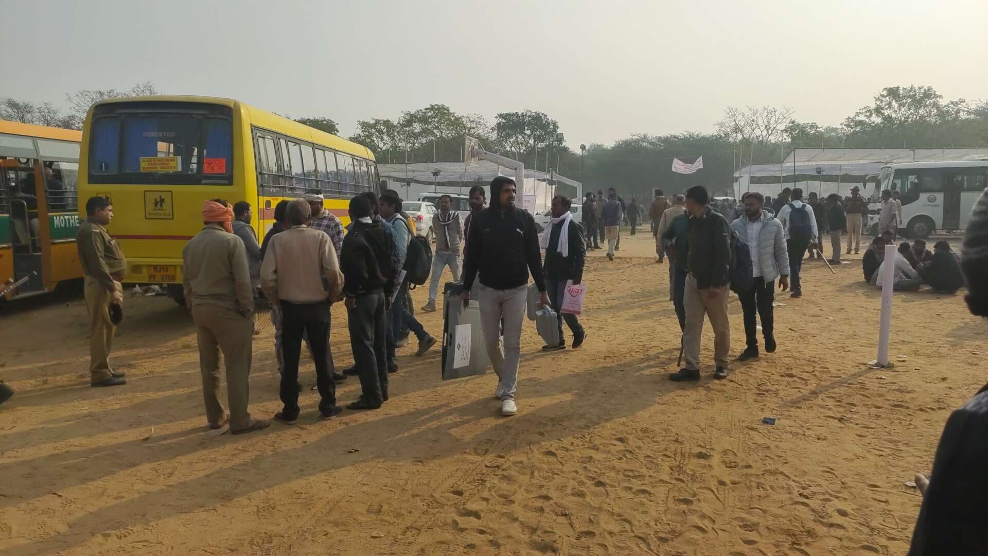 Employees leaving for polling station from Rajasthan College