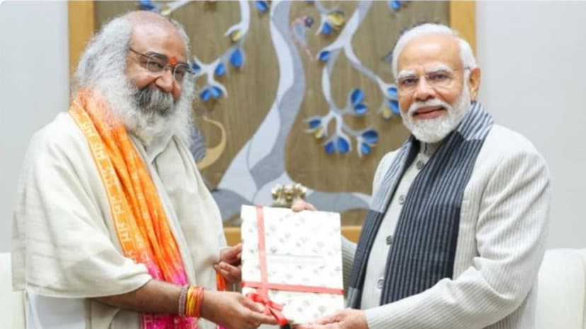 acharya pramod with pm modi.