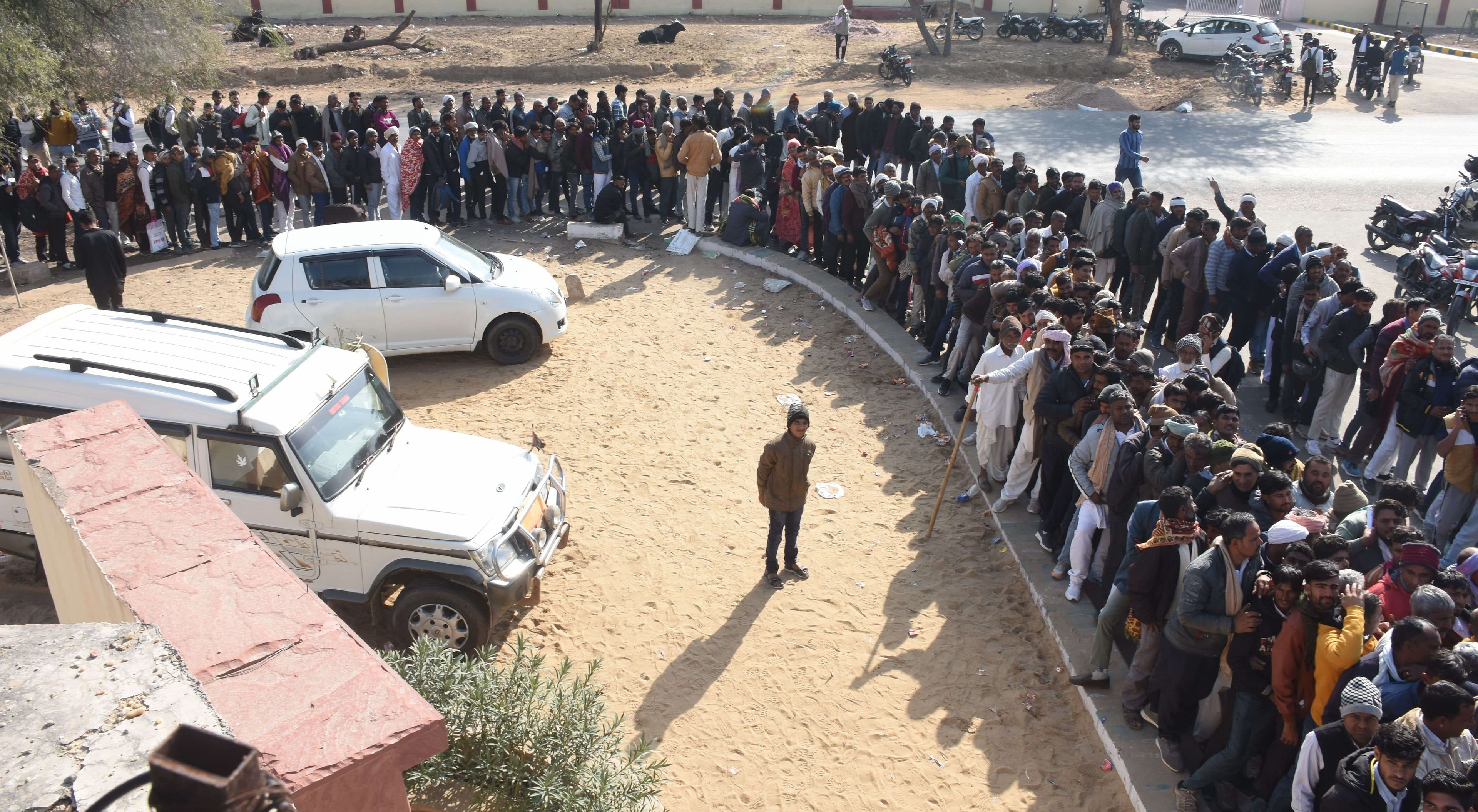 Crowd of farmers in seed distribution