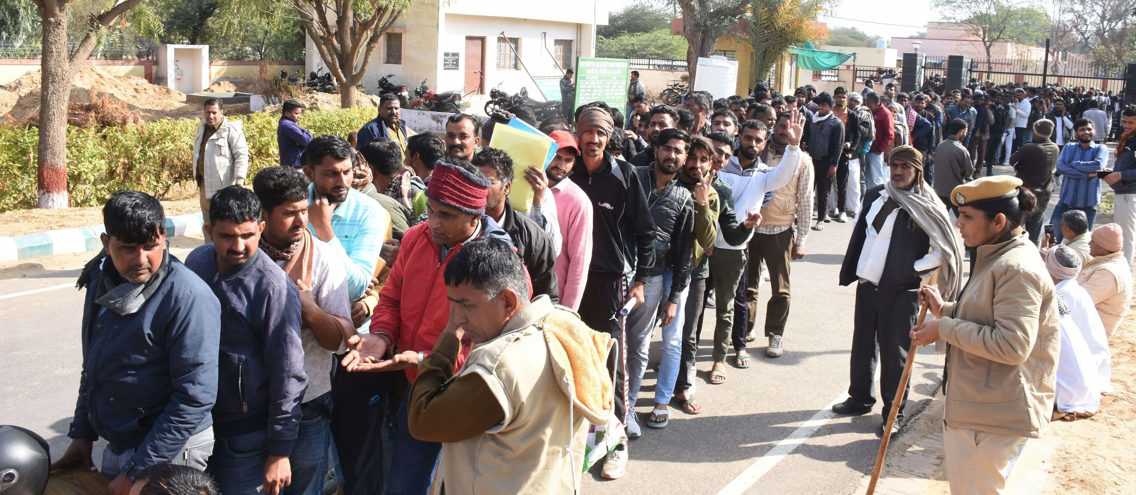 Crowd of farmers in seed distribution