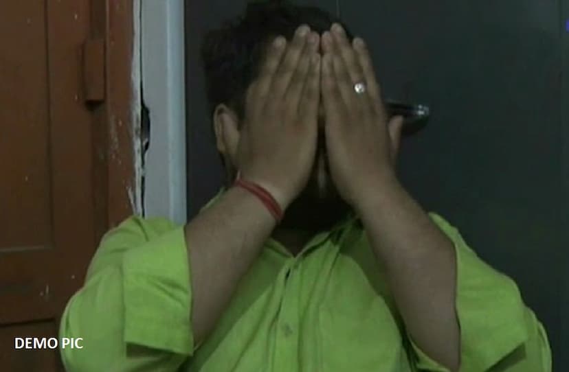 pujari_arrested.jpg