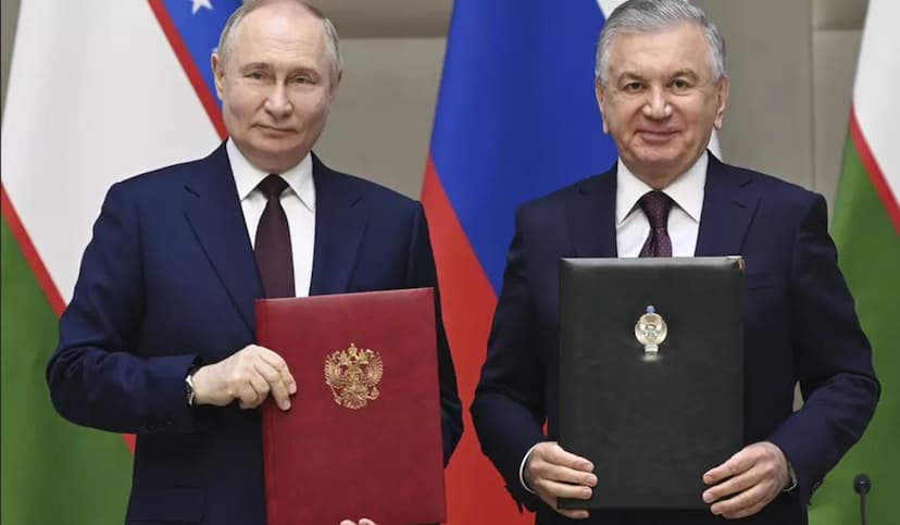 Vladimir Putin and Shavkat Mirziyoyev