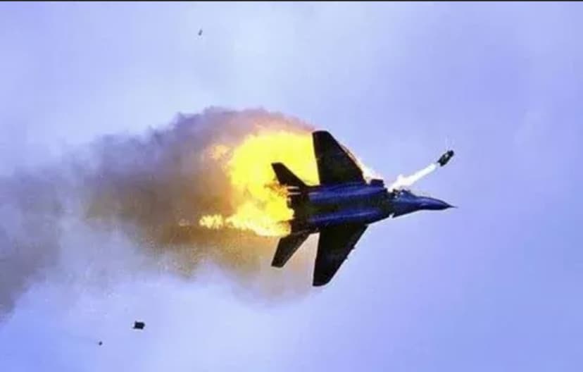 Burning fighter jet