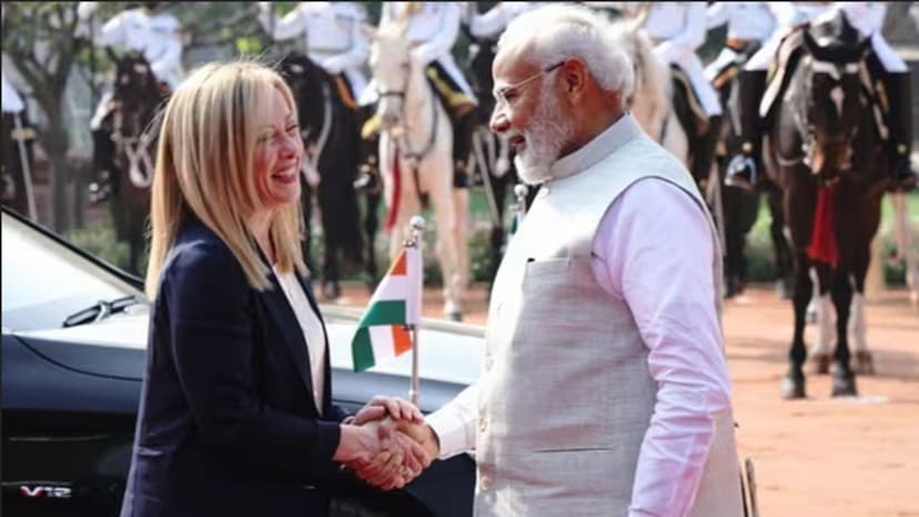 PM Narendra Modi shaking hands with Giorgia Meloni