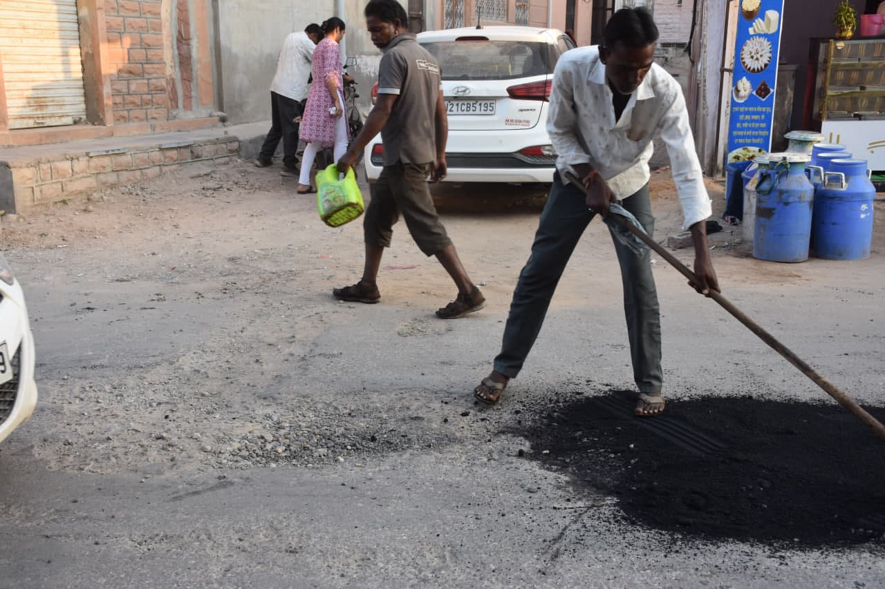 Pothole filling work continues in the city on Diwali