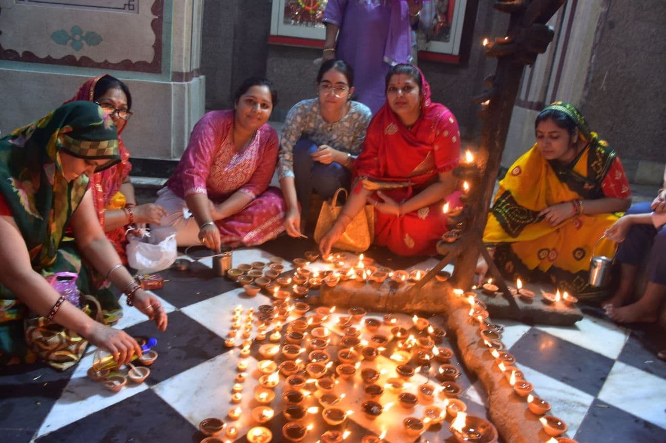 Illuminated temples on Kartik Purnima: Temples and buildings illuminated with lamps on Dev Diwali.