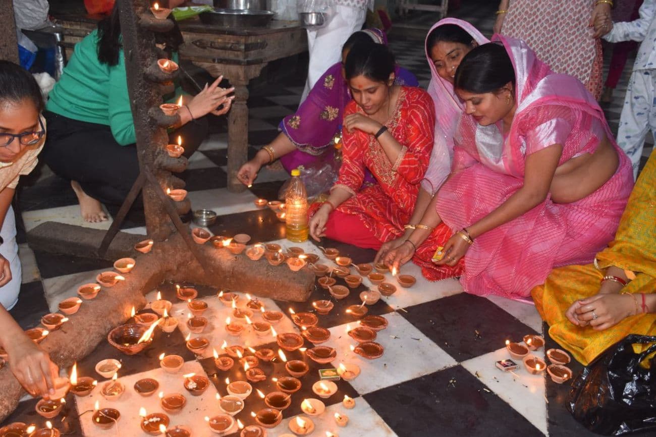 Illuminated temples on Kartik Purnima: Temples and buildings illuminated with lamps on Dev Diwali.